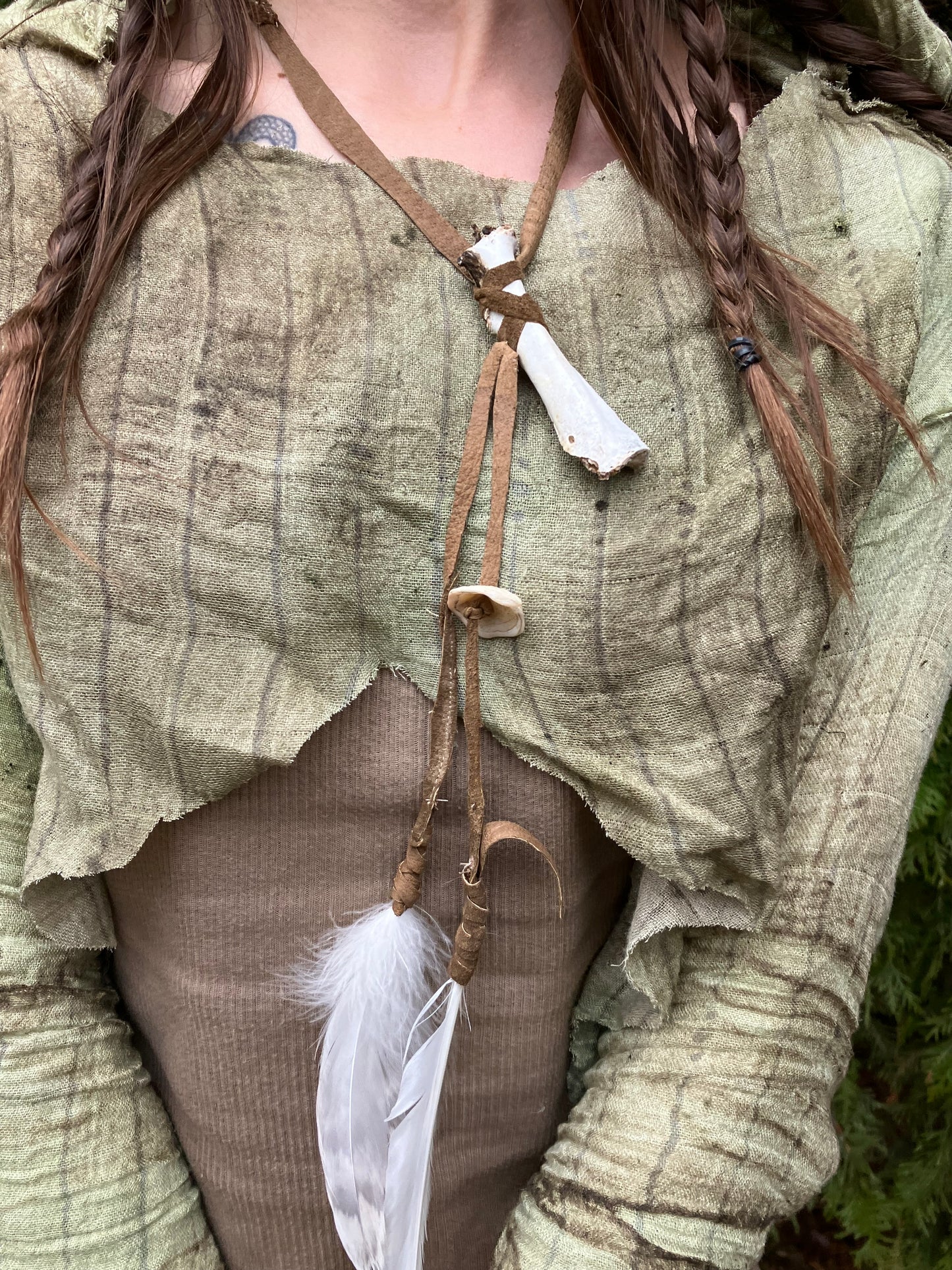 wildcrafted bone , feather & shell leather accessory piece