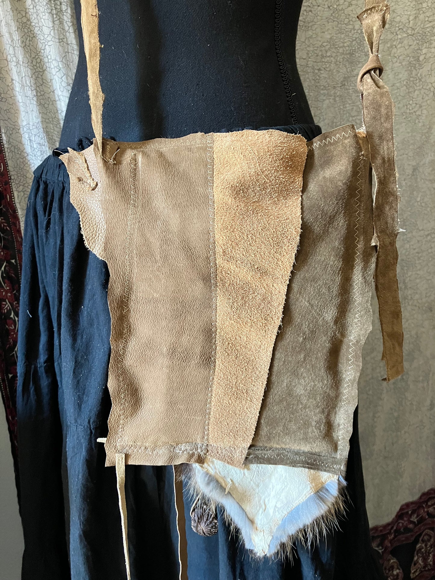 leather, fur & feather satchel