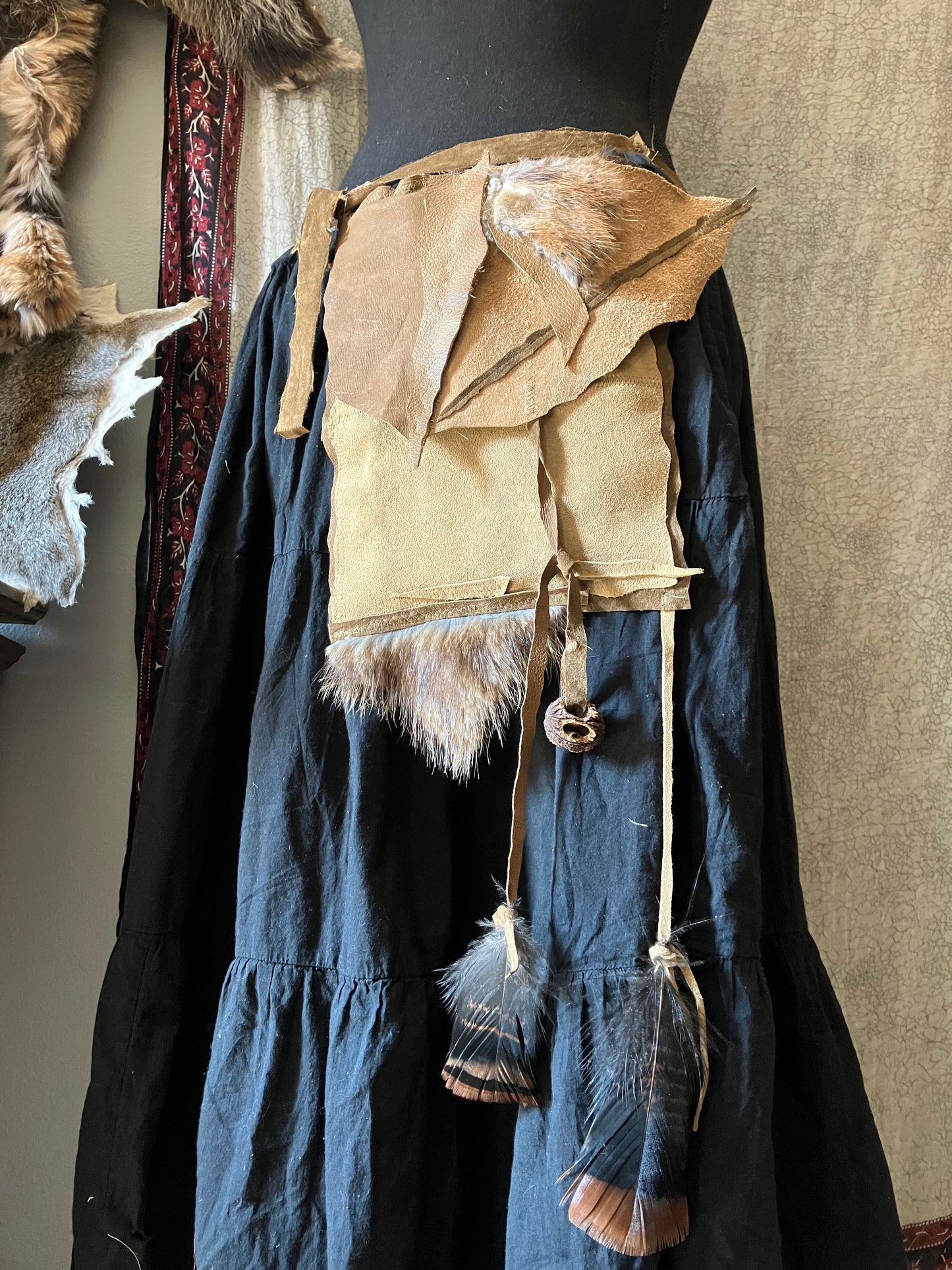 leather, fur & feather satchel