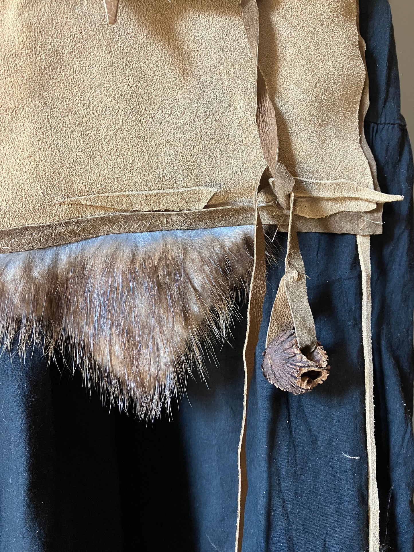 leather, fur & feather satchel